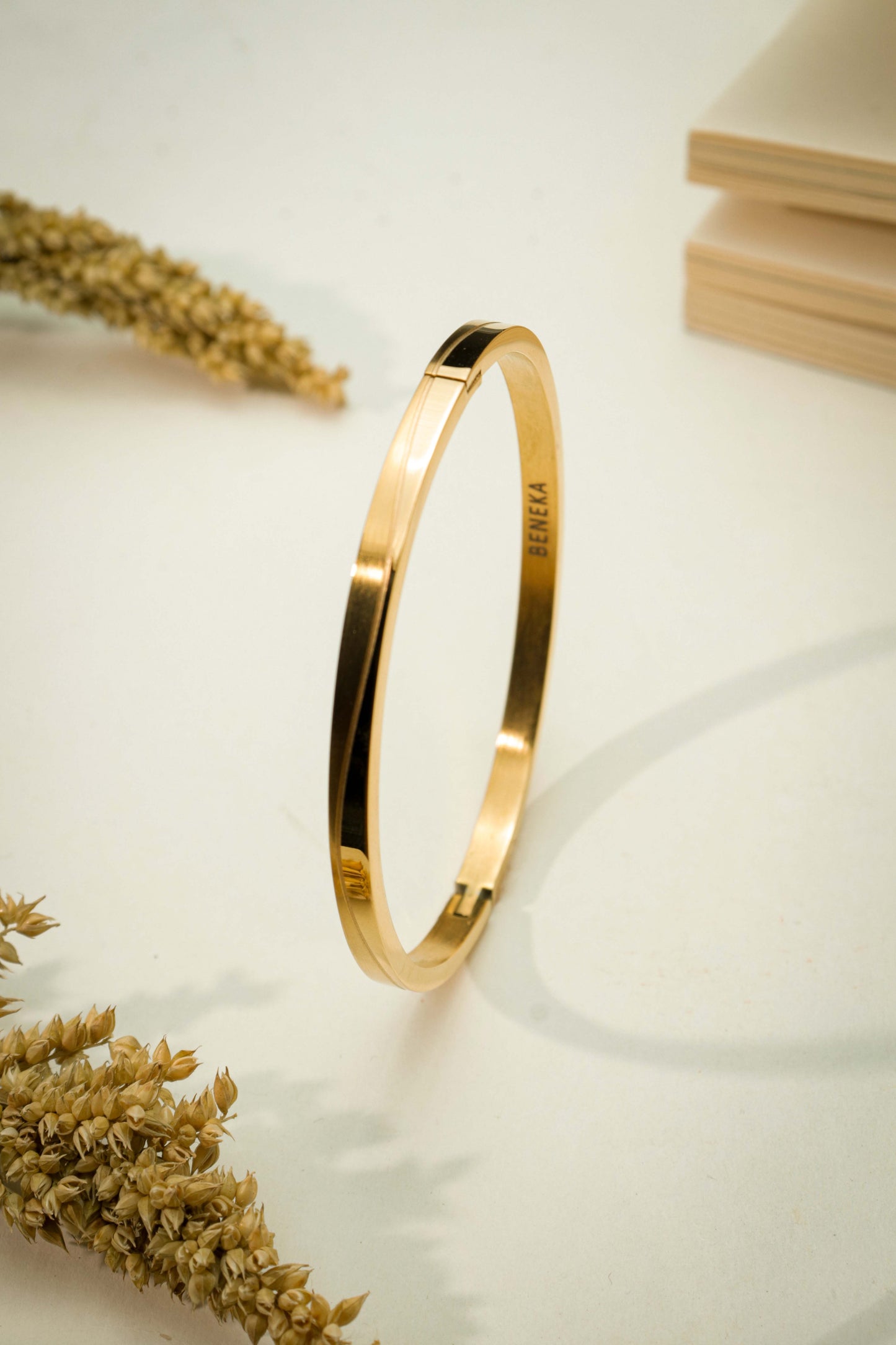 Obsidian Curve (Golden Toned) Metal Bracelet