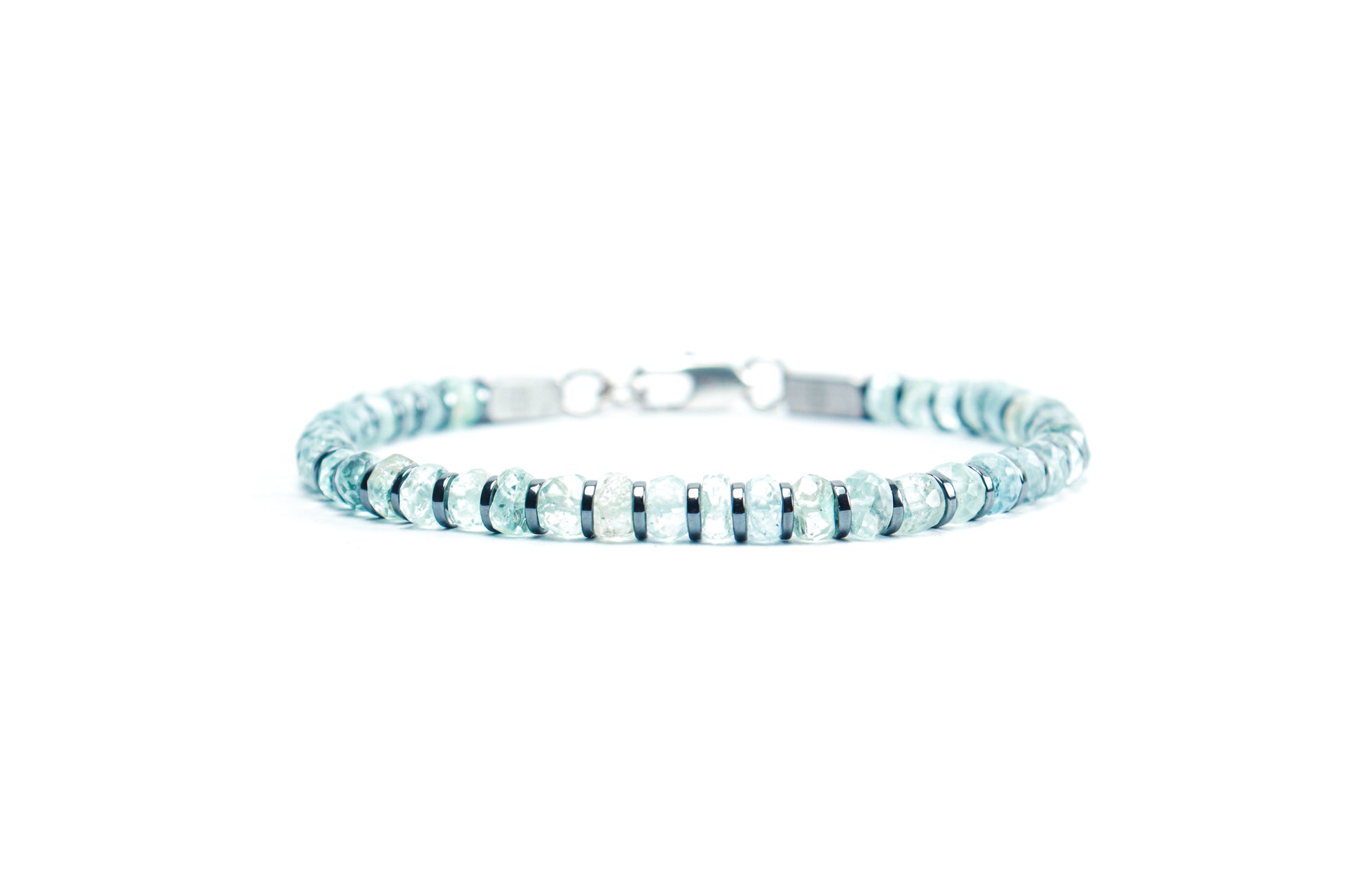 Beneka Aquamarine Bracelet – Natural Stone Clasp-Lock Bracelet featuring faceted disc-cut Aquamarine beads (2–3mm) with elegant gunmetal-finish spacers and clasp, handcrafted on premium elastic silicone cord. Luxury gemstone jewelry for calmness, clarity, and ocean-inspired style.