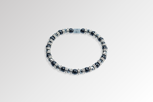 Black Onyx Bracelet by Beneka – Natural Stone Slip-On Bracelet with 6mm polished Black Onyx beads, stainless steel rings, and premium elastic silicone cord. Elegant unisex luxury wrist accessory for protection, style, and energy balance.